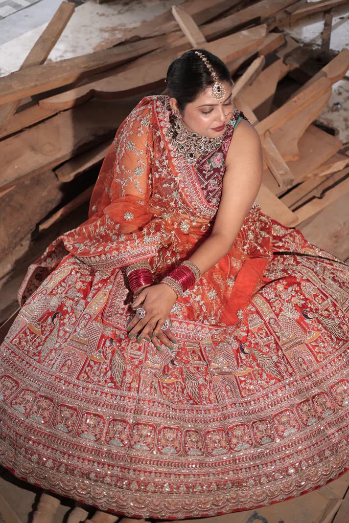 Exquisite Crimson Charm Lehenga with hand-embroidery in Raw Silk